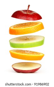 Levitating Fresh Sliced Fruit,  Isolated On White