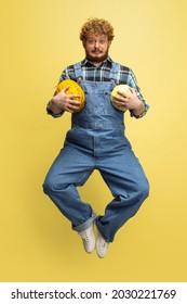 Levitation. Funny Bearded Man, Farmer With Big Melon And Cabbage Flying Isolated Over Yellow Studio Background. Concept Of Professional Occupation, Work, Job, Organic Food. Copyspace For Ad, Text.