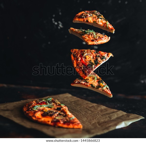 Levitation Pizza On Black Background Stock Photo (Edit Now) 1445866823