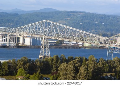 Lewis And Clark Bridge Over Columbia River And Industrial Zone