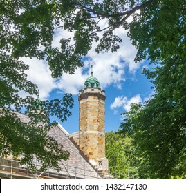 Lewiston, Maine / USA - June 22 2019: Steeple On The Peter J. Gomes Chapel At Bates College Surrounded By Maple Leaves