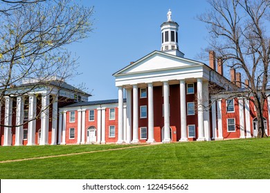 Lexington, USA - April 18, 2018: Washington and Lee University hall in Virginia exterior facade during sunny day exterior orange brick architecture, lawn