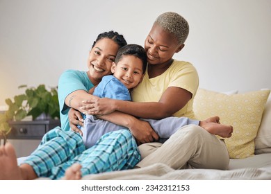 LGBT, bedroom hug and family portrait, happy child and mothers bond, relax and enjoy time together. Home, bed and gay people, queer parents or lesbian women support, care and hugging adoption kid - Powered by Shutterstock