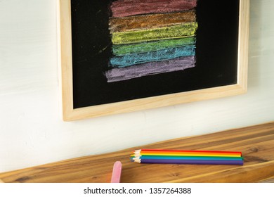 LGBT Flag Painted On A School Board / Tolerance Learning Concept