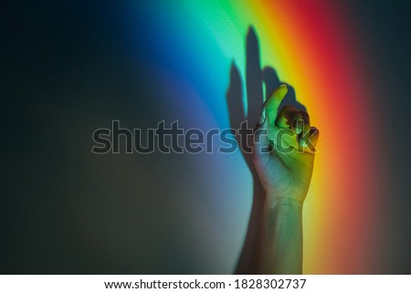 Similar – Foto Bild Frauenhand mit einem darin projizierten Regenbogen