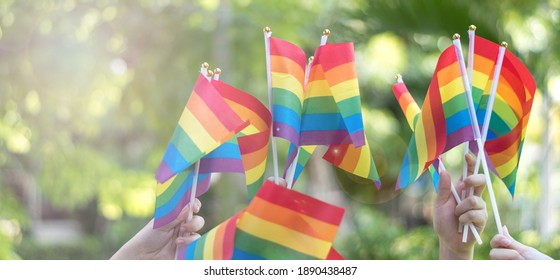 LGBT, pride, rainbow flag as a symbol of lesbian, gay, bisexual, transgender, and queer pride parade and LGBTQ social movements in June month