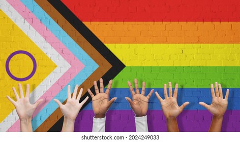 Lgbtq, Trans And Intersex Rights Concept - Multiracial Human Hands Over Rainbow Progress Pride Flag On Background