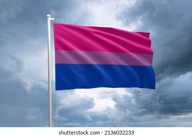 LGBTQIA+ Bisexual Pride Flag. Bisexuality Flag Symbol In The Lgbt Community. Dramatic Stortmy Clouds On The Background