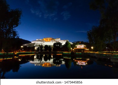 Lhasa Ex Tibet Now China, Chengguan District The Potala Palace, Night View With Reflection On The Pond