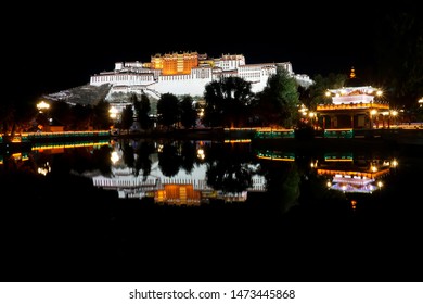 Lhasa Ex Tibet Now China, Chengguan District The Potala Palace, Night View With Reflection On The Pond