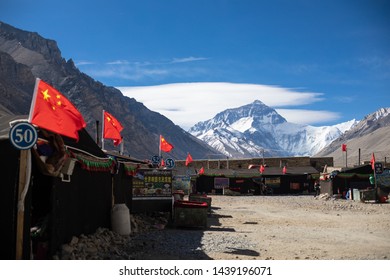 Lhasa, Tibet Autonomous Region - May 12, 2019: Chinese Flags Are Atop Every Tent At Mount Everest Base Camp By The Rongbuk Monastery On A Sunny Afternoon.