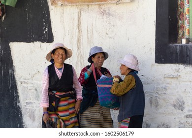 Lhasa, Tibet, China, Chengguan District, June 24 2019: Meeting With Women Wearing Traditional Clothes, Close-up View