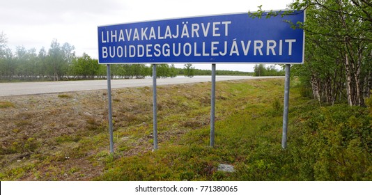 Lhavakalajarvet Buoiddesguollejavrrit, Finnish Traffic Sign With The Name Of Village Lhavakalajarvet Written In Finnish And Sami Language.