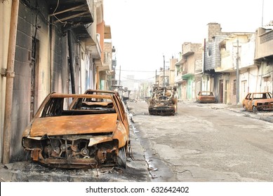 The Liberated Area In Iraq, The War On The Islamic State. Burned Cars.