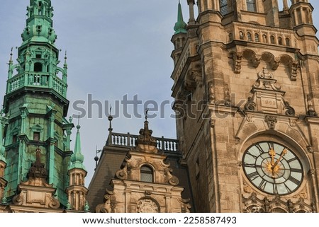 Liberec Town Hall in the town of Liberec, Czech Republic. Neo-Renaissance building. Close up clocks on old cathedral, church in the middle of the square of Dr. Edvard Benes in the center of Liberec. 