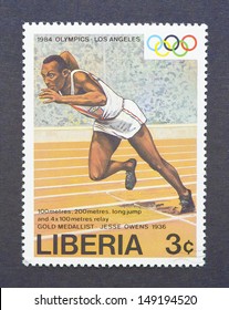 LIBERIA - CIRCA 1984: A Postage Stamp Printed In Liberia Showing An Image Of The Olympic Athlete Gold Medal Winner Jesse Owens, Circa 1984. 