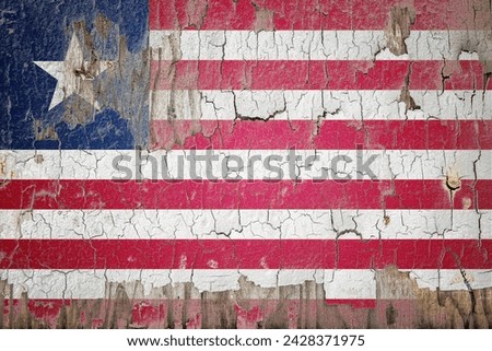 Liberia flag and paint cracks. Prison concept with border image. Liberia is currently heading toward recession. Inflation. employment. economic recession. Double exposure hologram