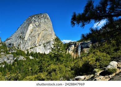Liberty Cap - a granite dome in Yosemite National Park which lies at the extreme northwestern margin of Little Yosemite Valley, adjacent to the north of Nevada Fall (California, United States) - Powered by Shutterstock
