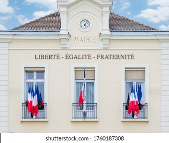 Liberty Equality Fraternity - The Motto Inscribed On The Front Of A Town Hall In France