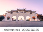 Liberty Square Arch in Chiang Kai-Shek Memorial Hall with sunrise background. The meaning of the Chinese texts on plaque is "Liberty Square".