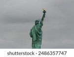 Liberty State Park proudly displays a statue representing liberty and resilience