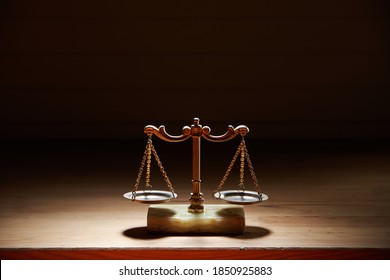 Libra Scale On The Wood Background