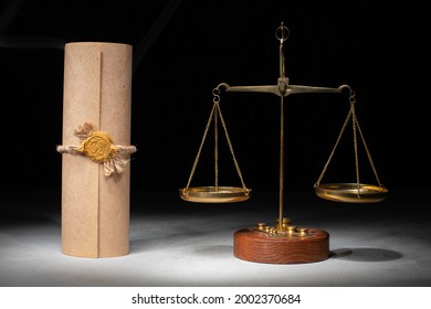 libra and stamp on testament and last will. dark background - Shutterstock ID 2002370684