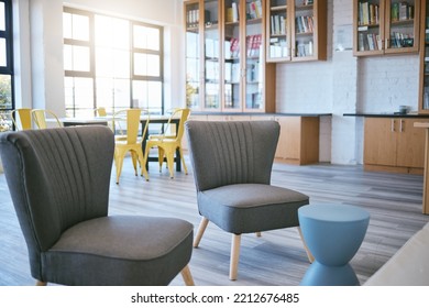 Library, Bookstore And Furniture With Interior Decorating, Wood Floor And Sunshine. College, University Or School Reading Lounge, Room Or Space To Relax With Books For Education, Learning And Study