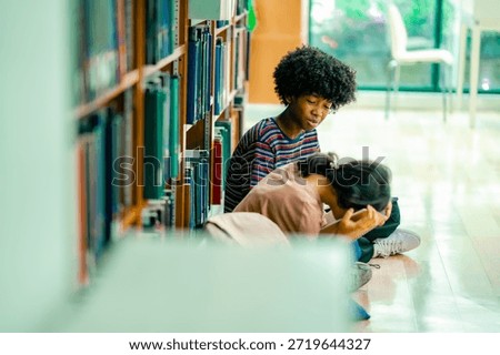 Library floor study scene with students reading books together, serious and stress emotion, worrie about exam, reflecting peer learning academic support knowledge exploration.