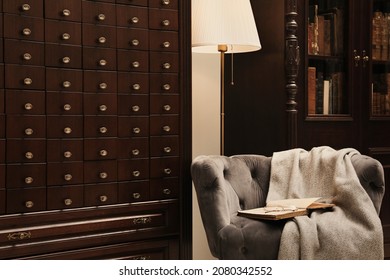 Library interior with wooden furniture and comfortable place for reading - Powered by Shutterstock