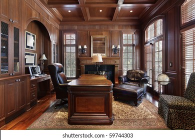 Library In Luxury Home With Large Desk