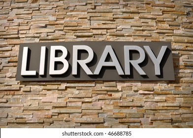 Library Sign On Stone Wall