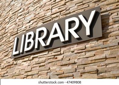 Library Sign On Stone Wall