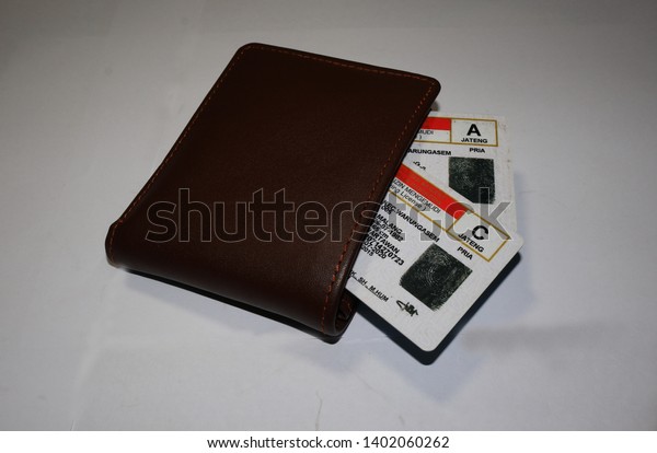 A\
license card to drive, in a leather wallet, Batang/Central Java\
Indonesia, May 19, 2019                         \
