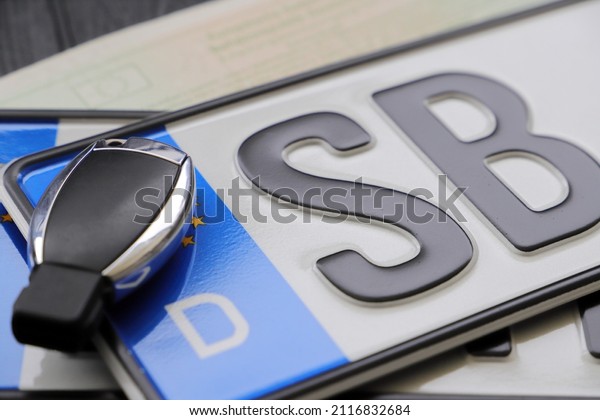 License plate with a car\
key