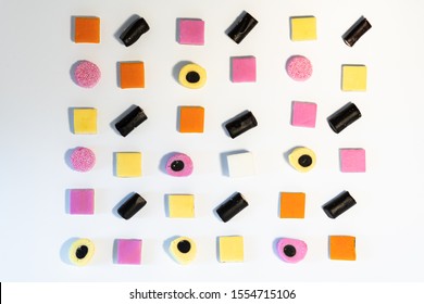 Licorice Allsorts in a orderly pattern. This candy is typical British.