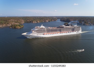 Lidingo, Sweden - July 31, 2018: Aerial View Of The Cruise Ship MSC Preziosa Operated By MSC Cruises Leaving Stockholm On A 15 Days, Round-trip Northern Europe Cruise, 19 Jul, 2018 - 02 Aug, 2018.