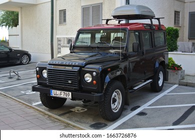 LIDO DI JESOLO, ITALY - JUNE 15, 2014: Land Rover Defender Popular Famous British Off Road Vehicle On The City Street