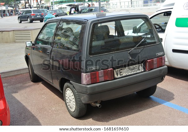 LIDO DI JESOLO, ITALY - JUNE 20, 2014: Autobianchi\
Y10 designer city compact and economy 1990s car manufactured from\
1985 to 1995 marketed under the Lancia brand in most export markets\
as Lancia Y10