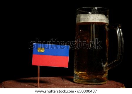 Liechtenstein flag with beer mug isolated on black background