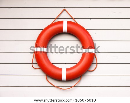 life belt, rescue ring (36) on wooden wall