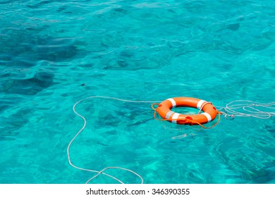 A Life Buoy In The Sea