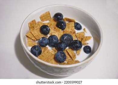 LIFE Cereal With Blueberries And Coconut Milk.