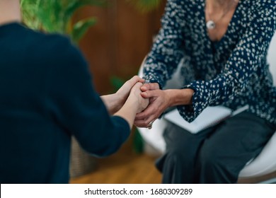 Life Coach Having A Counseling Session With A Female Client