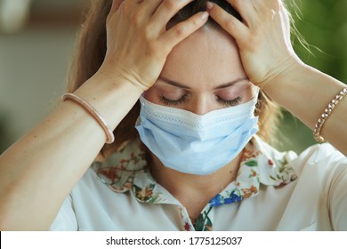 Life During Coronavirus Pandemic. Stressed Stylish Woman In White Blouse With Medical Mask.