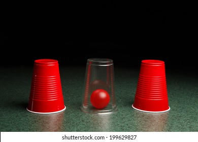 Life Is Easy When You Know The Answers.  Location Of Red Ball Is Revealed By Clear Cup.  Copy Space.