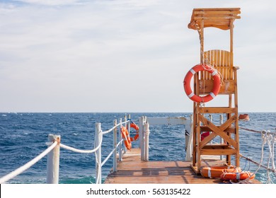 Life Guard Tower At The Eand Of Pier