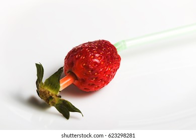 Life Hack By Pulling The Tail Of Strawberries.