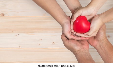 Life Insurance, Organ Donor Donation, Give Life Charity And Health Assurance For Family Protection, Parents' Day Concept With Father-mother Or Nurse And Children Supporting Red Heart Together