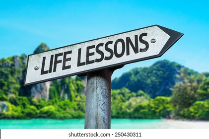 Life Lessons Sign With A Beach On Background